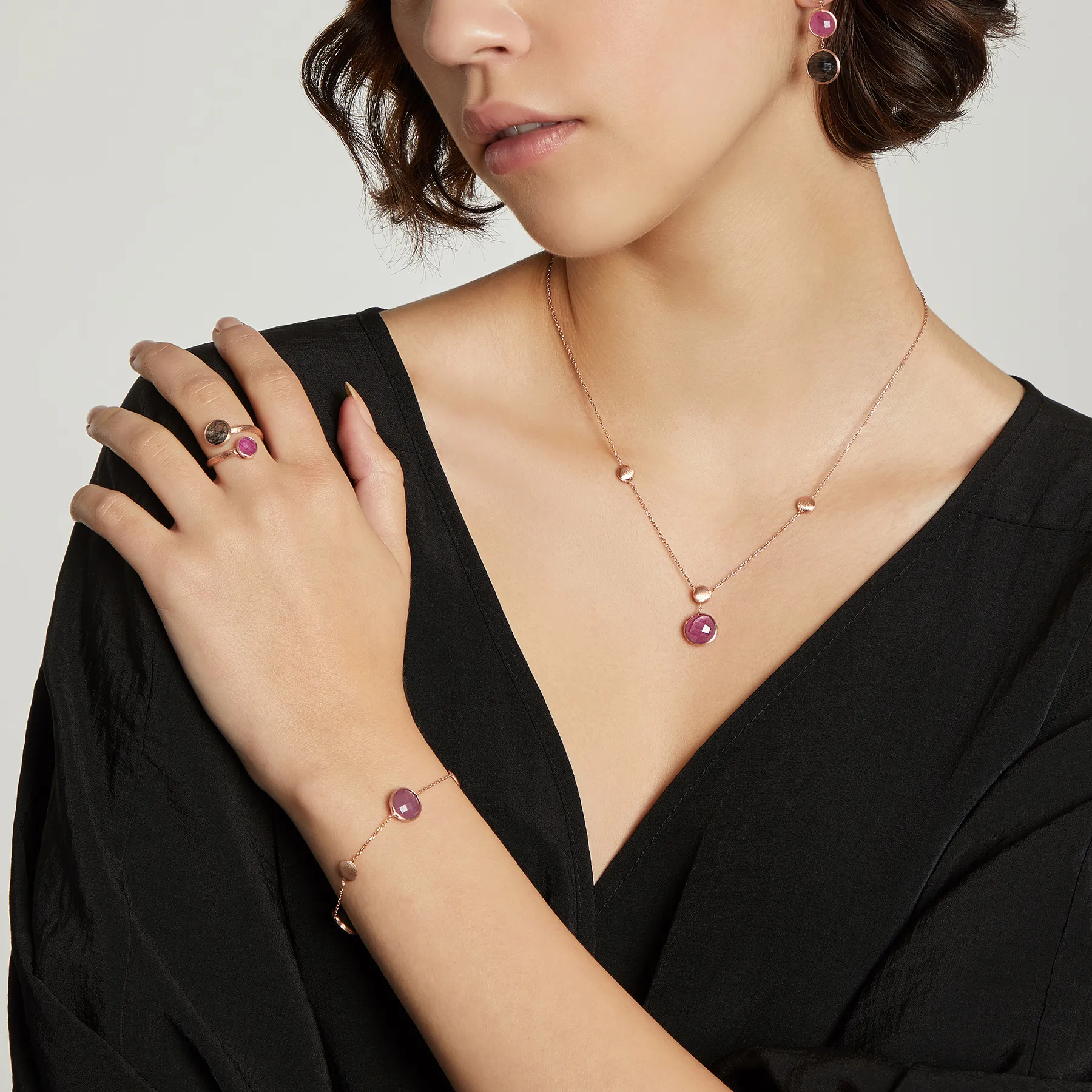14K satin rose gold Kensington ring with black rutilated quartz and ruby root